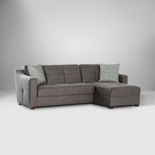 Modern Tahoe sectional with leatherette upholstery, button-tufting, and modular chaise lounge