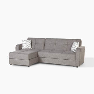 Modern Vision chaise lounge sectional with fold-out sleeper and matching ottoman for versatile comfort.