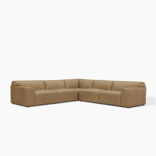 Luxury Dakota sectional sofa featuring full-grain leather, flexible modular setup, and timeless elegance.