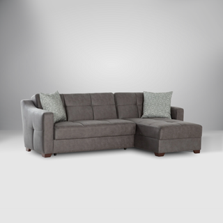 Serenity sectional sofa with modular chaise lounge and trendy ottoman featuring leatherette upholstery.