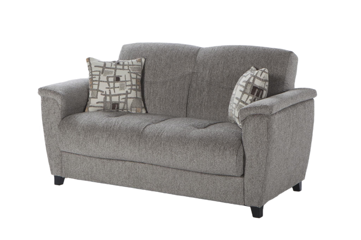 The Aspen Loveseat showcases a modern design with rich leatherette upholstery and diamond piping.