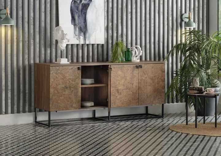 The Avenir Console serving as an upscale nightstand in a modern bedroom setting.