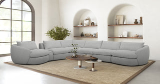 The Azelea Sectional Sofa with premium beige fabric, showcasing its high-quality upholstery.