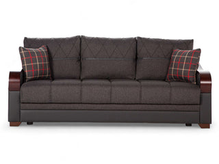 The Bennett Collection Sofa featuring diamond piping and a mix of leatherette and fabric upholstery.