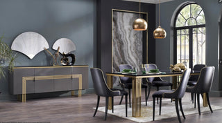 The Carlino Chair epitomizes modern luxury with its polished surfaces and velvety upholstery.