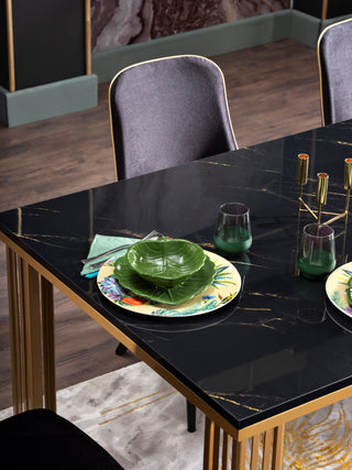 The Carlino Table with an exquisite marble tempered finish and sturdy construction, perfect for modern interiors.