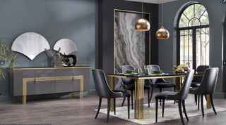 The Carlino Table highlighting its gold trim accents and polished marble finish for a luxurious dining experience.