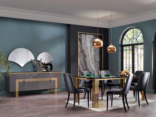 The Carlino Table featuring a marble tempered finish and gold metal legs, showcasing modern elegance and durability.