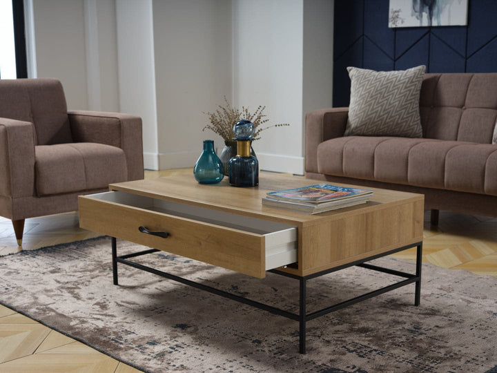 The Drift Coffee Table’s ergonomic handle adds ease of use to its stylish design.