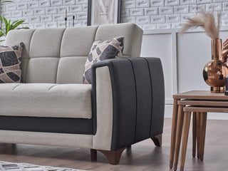 The Dublin Sofa’s round arms and modern design provide a stylish and comfortable addition to any room.