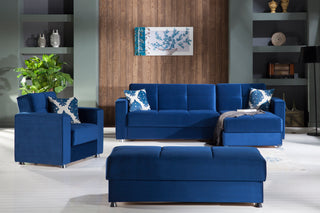 Experience luxury with the Elegant Armchair upholstered in rich royal blue velvet, perfect for adding sophistication to your home.