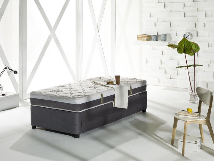 Compact design of the Four Season High Rise bed with an extra mattress for efficient use of space.