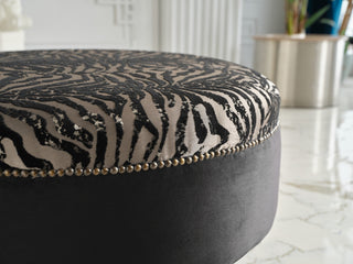 Durable Gaze Round Ottoman with sturdy internal frame and top-grade fabric.