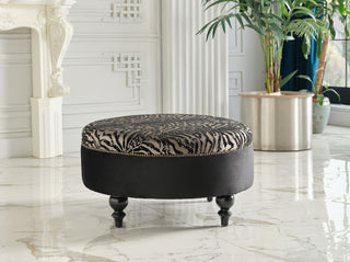 Luxurious Gaze Round Ottoman with elegant design and premium-grade cushioning.