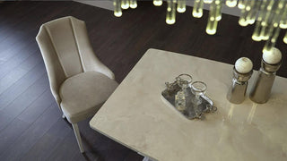 Sophisticated Gravita Dining Table, perfect for enhancing any dining room.