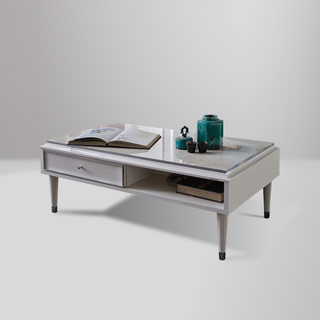 Gravita modern coffee table with sleek design, built-in drawer, and durable wood-heavy construction for stylish storage.