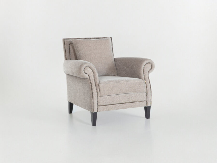 Classic Java Accent Armchair with elegant nail head trimming and luxurious fabric upholstery.