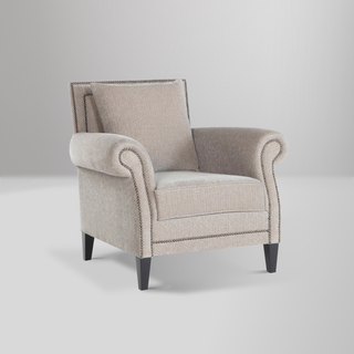 Java Accent Armchair with elegant nail head trim, luxurious fabric, and superior cushioning for timeless sophistication