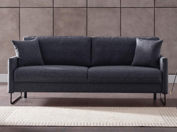 Laura sofa that easily converts into a full-size bed, ideal for guests.