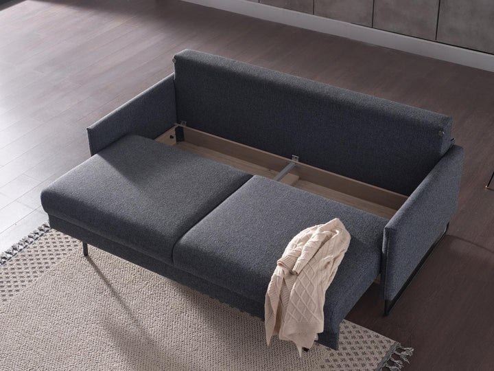 Space-saving Laura convertible sofa, providing seating and sleeping solutions.