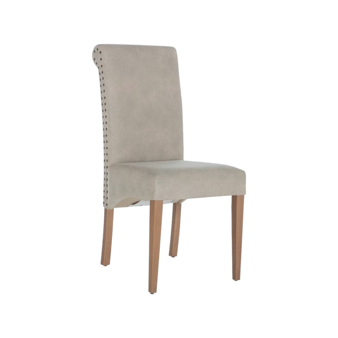 Margo Dining Chair with chic details and soft, inviting colors, perfect for any dining setting.