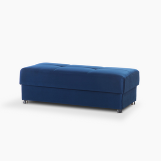 Modern blue velvet ottoman with sleek chrome legs and hidden storage, perfect for enhancing living room decor