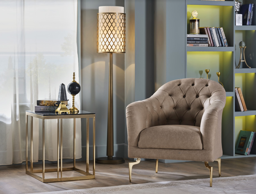 Montego Armchair with retro charm and modern functionality, featuring rich earthy hues, chic gold accents, and a pull-out seat that transforms into a daybed.