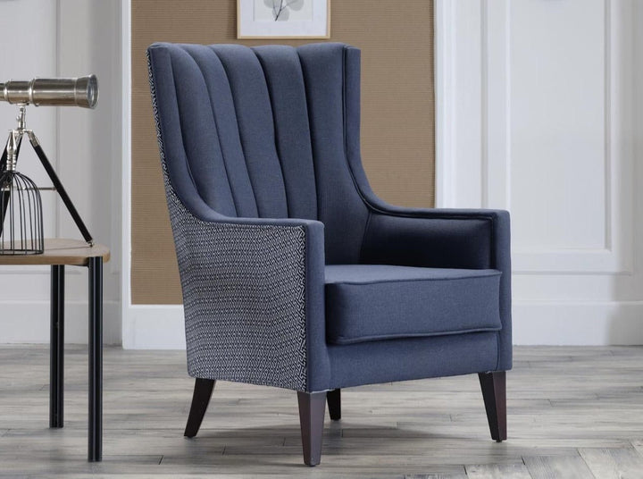 Traditional Palmer Armchair with modern touch. Foam cushioning, Corvet Anthracite finish, and natural wood legs combine style and durability.