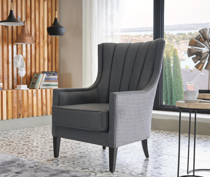 Traditional-style Palmer Armchair with foam cushioning and a Corvet Anthracite finish. Natural wood legs add elegance and durability for lasting appeal.