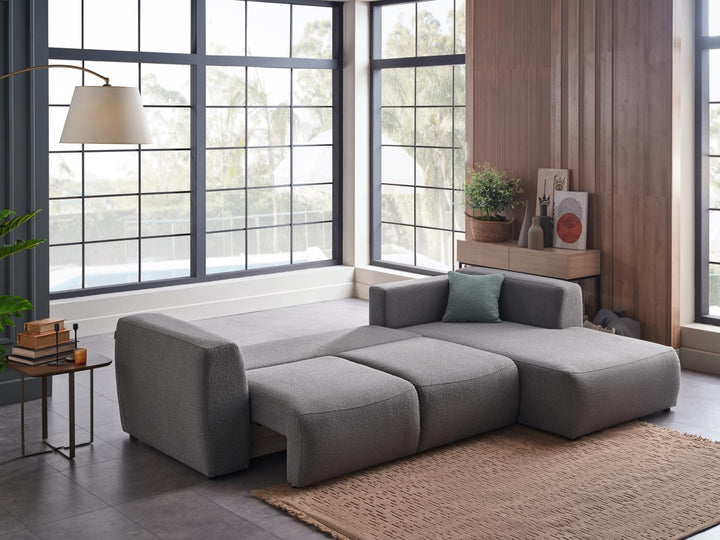 Elegant and comfortable Picasso Sleeper Sectional with plush cushions and a sleeper function for added versatility.