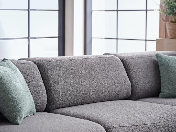 Enhance your space with the modern aesthetic of the Picasso Sleeper Sectional. Stylish design and practical sleeper feature.