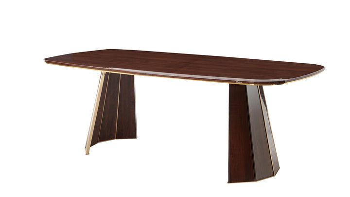 The Plaza Dining Table features a modern oval shape with gold case hardware and a dark brown frame. Crafted from engineered wood, it's both stylish and durable.