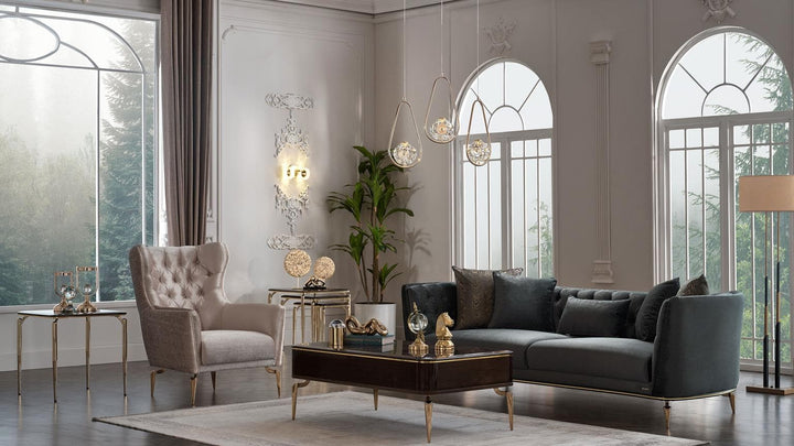 The Plaza Living Room Set combines modern and traditional elements with a solid wood frame, gold metal legs, and plush polyester upholstery for a refined look.