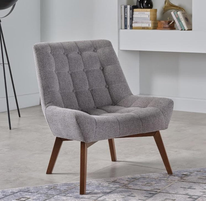 Revere Accent Chair featuring high-density foam cushioning and a wooden frame. Ideal for living rooms, bedrooms, or offices with its modern and comfortable design.