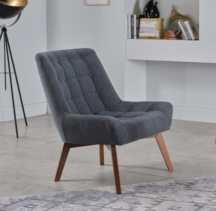 Revere Accent Chair with a sleek modern design, high-density foam, and wooden frame. Perfect for enhancing any interior decor with elegance and style.