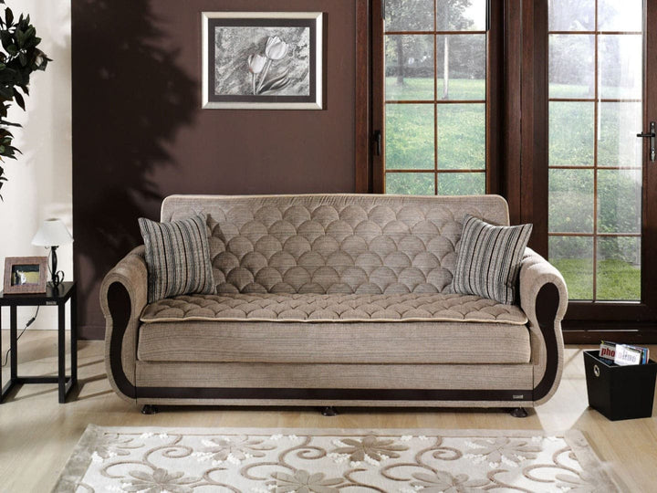 The tailored scallop tufting on the Argos Living Room Set adds a touch of elegance to any space.