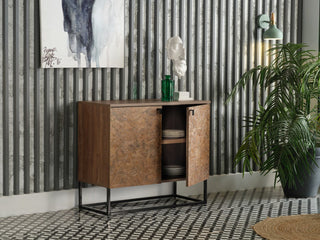 The Avenir Console featuring wrought iron hardware, providing a striking contrast against the wood finish.