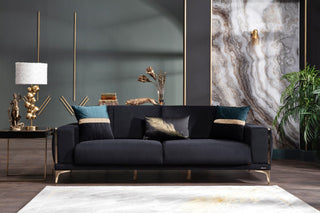 Refined armchair with plush velvet and gold accents, adding a touch of luxury.