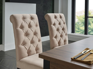 James Dining Chair with elegant button tufting and a tall rolled back for a touch of sophistication.