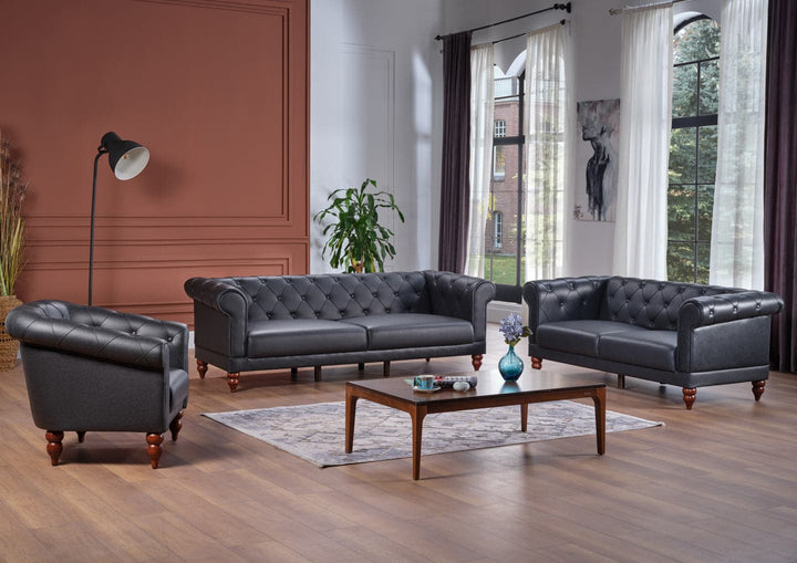 Elegant Muse sofa in synthetic leather with Chester design. Offers traditional charm and modern comfort, perfect for contemporary and mid-century décor.