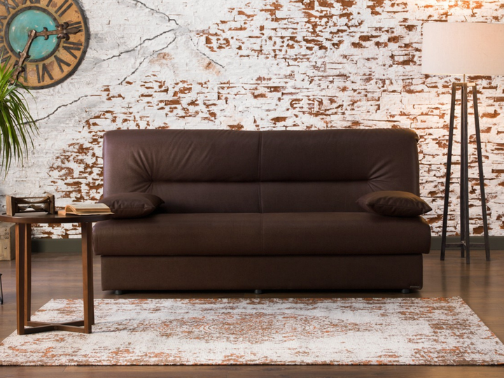 Regata Sleeper Sofa with a modern design, featuring firm cushions, tufted detailing, and chrome legs. Converts easily into a comfortable sleeper with built-in storage.